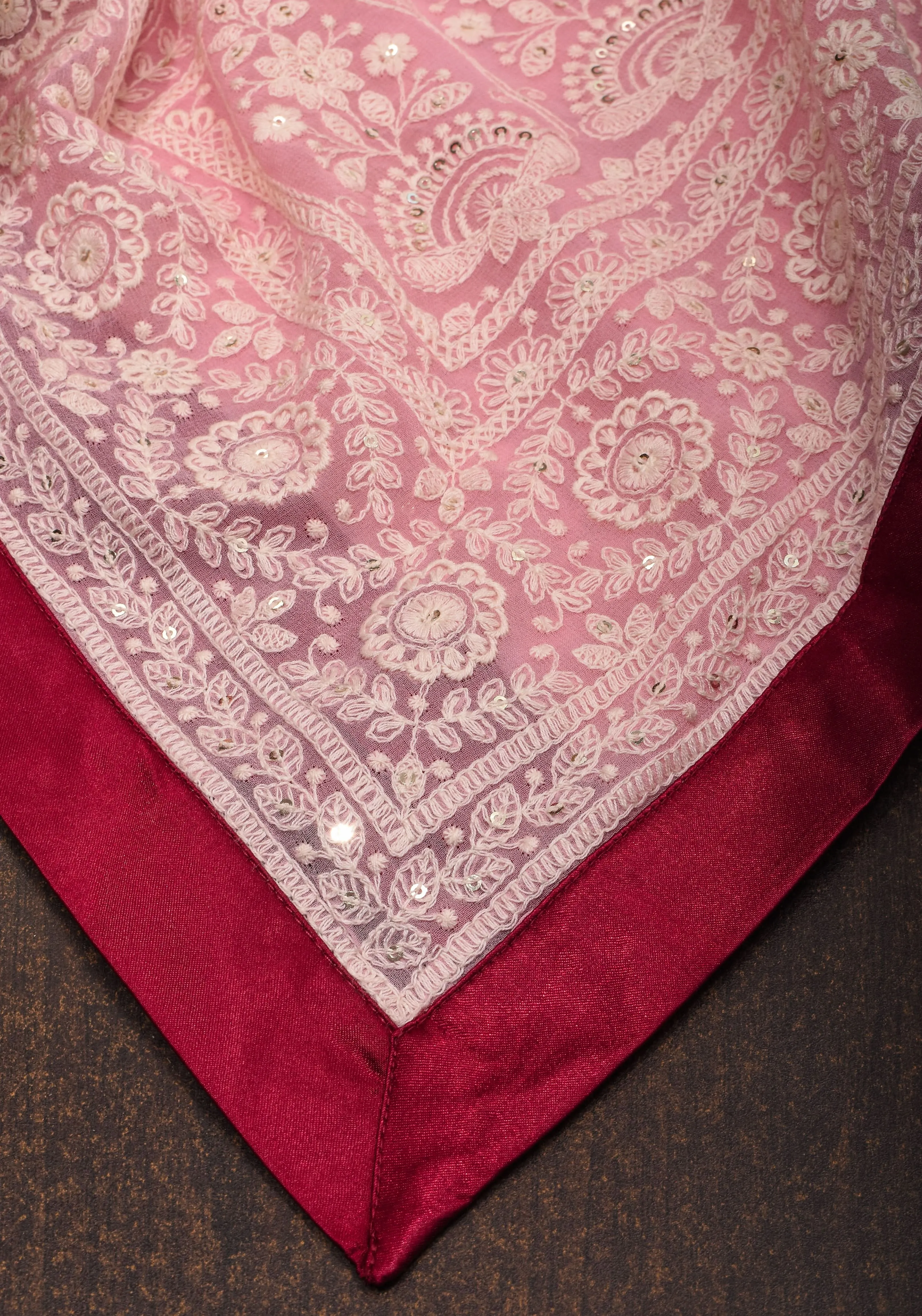 Charming Pink Georgette Saree with Self Embroidery and contrasting Pomegranate satin trim