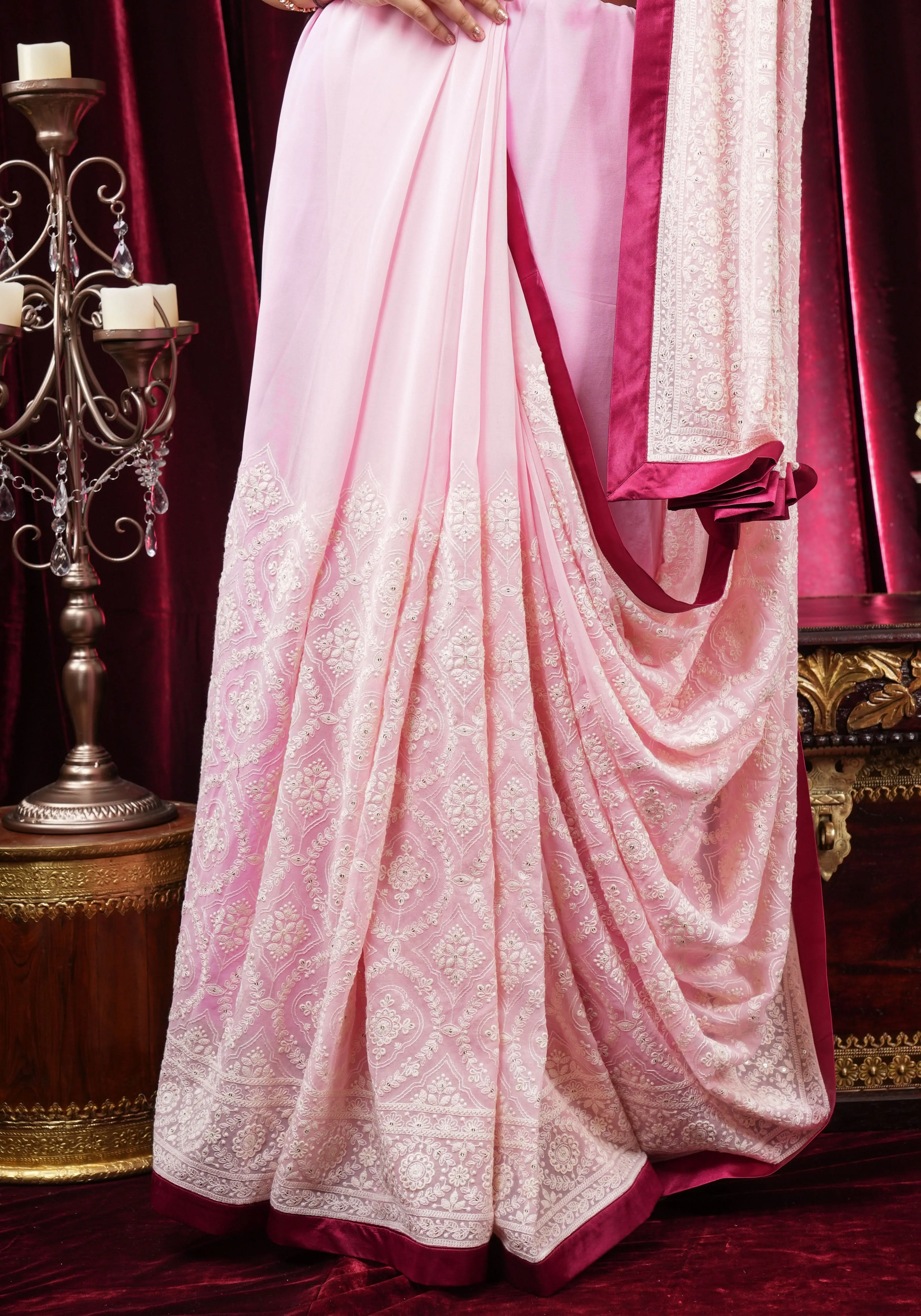 Charming Pink Georgette Saree with Self Embroidery and contrasting Pomegranate satin trim